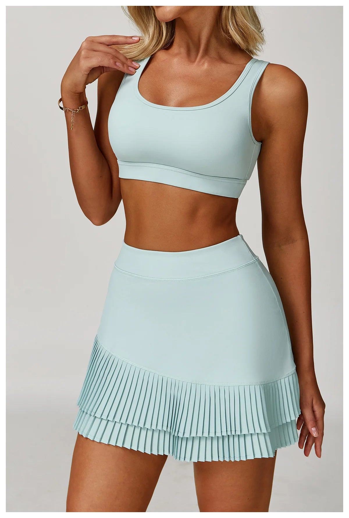 Women's fitness yoga and gym outfit set by The Clothing Company Sydney, includes sports bra, leggings, and matching workout tracksuit.