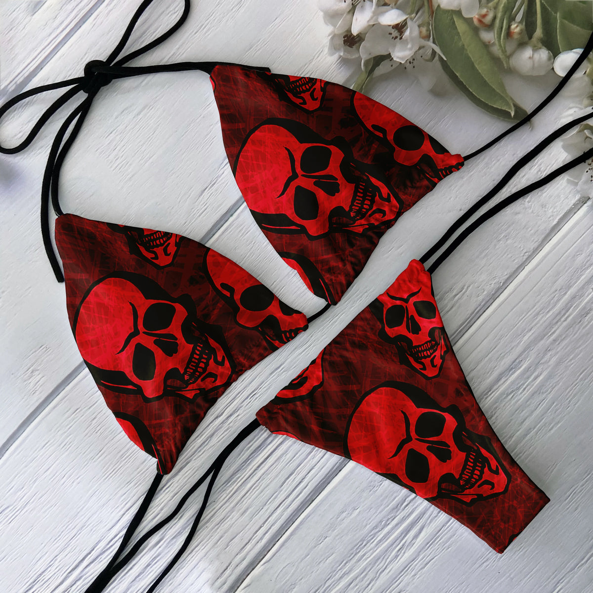 Backless 2-piece bikini set for women with skull print, low waist design, perfect for beach surfing and vacation by The Clothing Company Sydney.