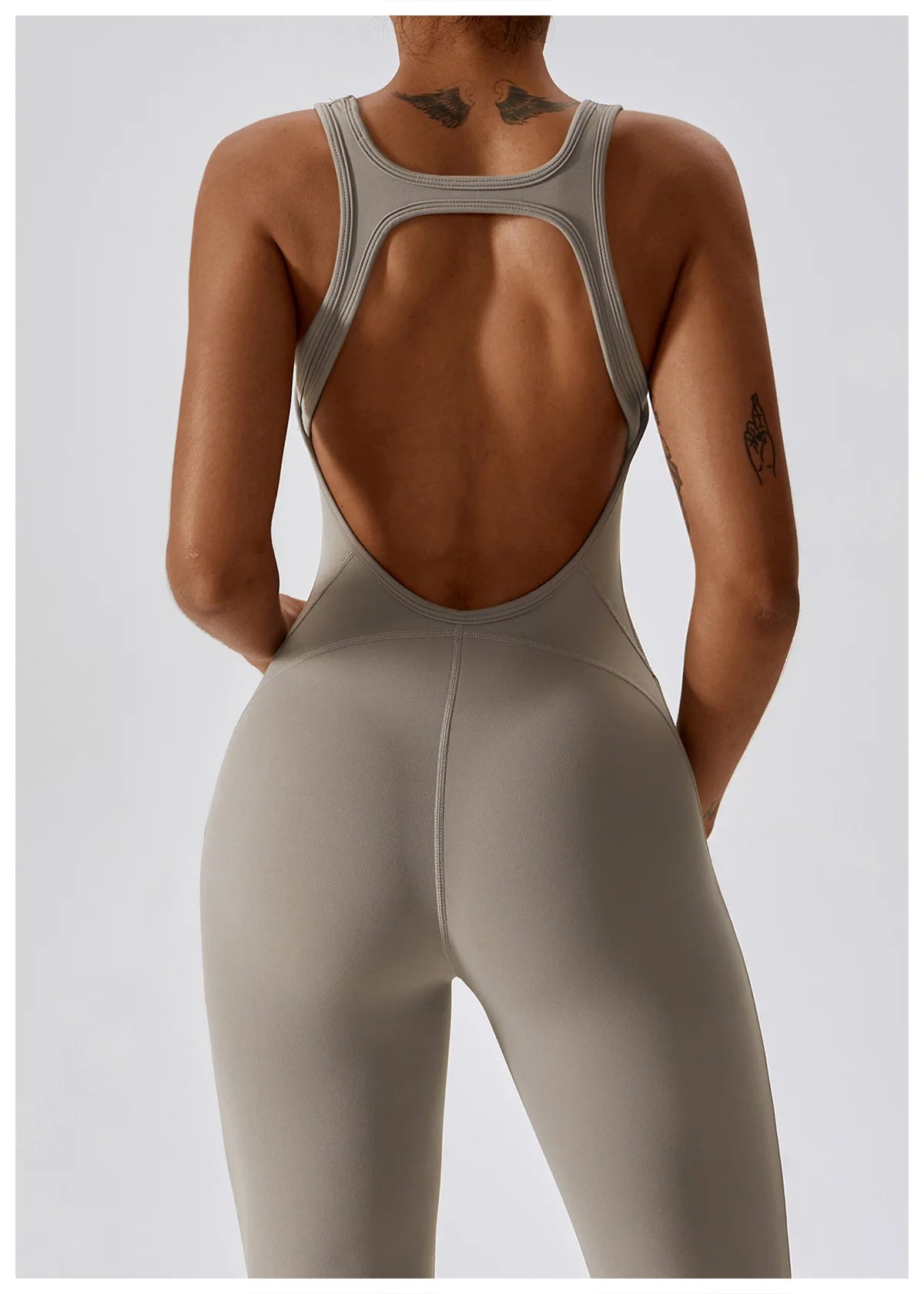 Open back V jumpsuit gym set by The Clothing Company Sydney, women's fitness sportswear, stretch yoga and workout bodysuit.