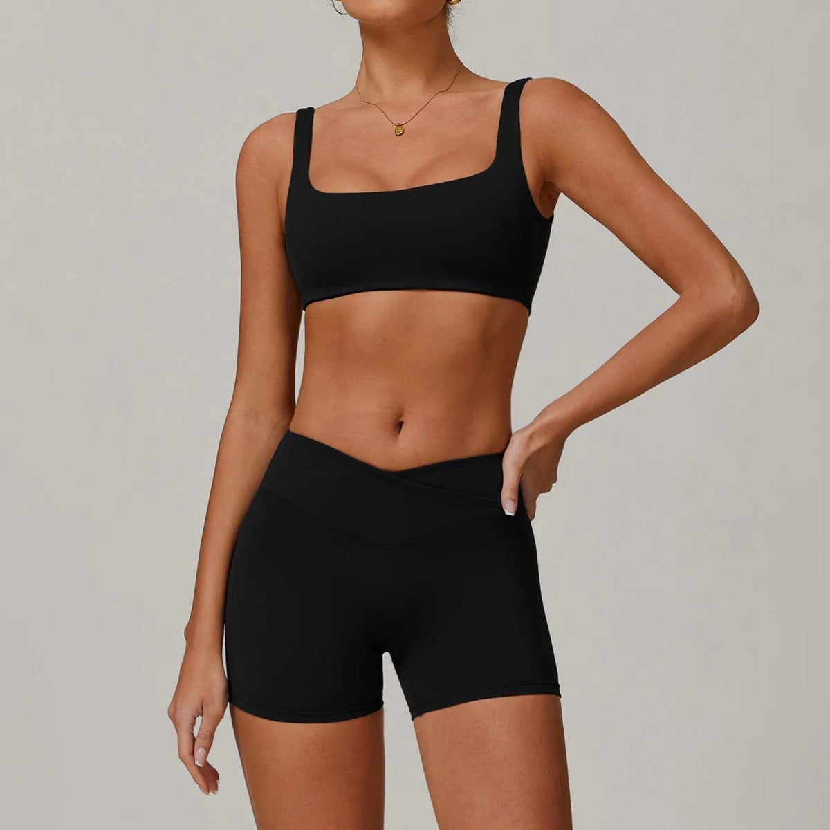 Two-piece women's yoga and workout set with sports bra and leggings by The Clothing Company Sydney for fitness and activewear.