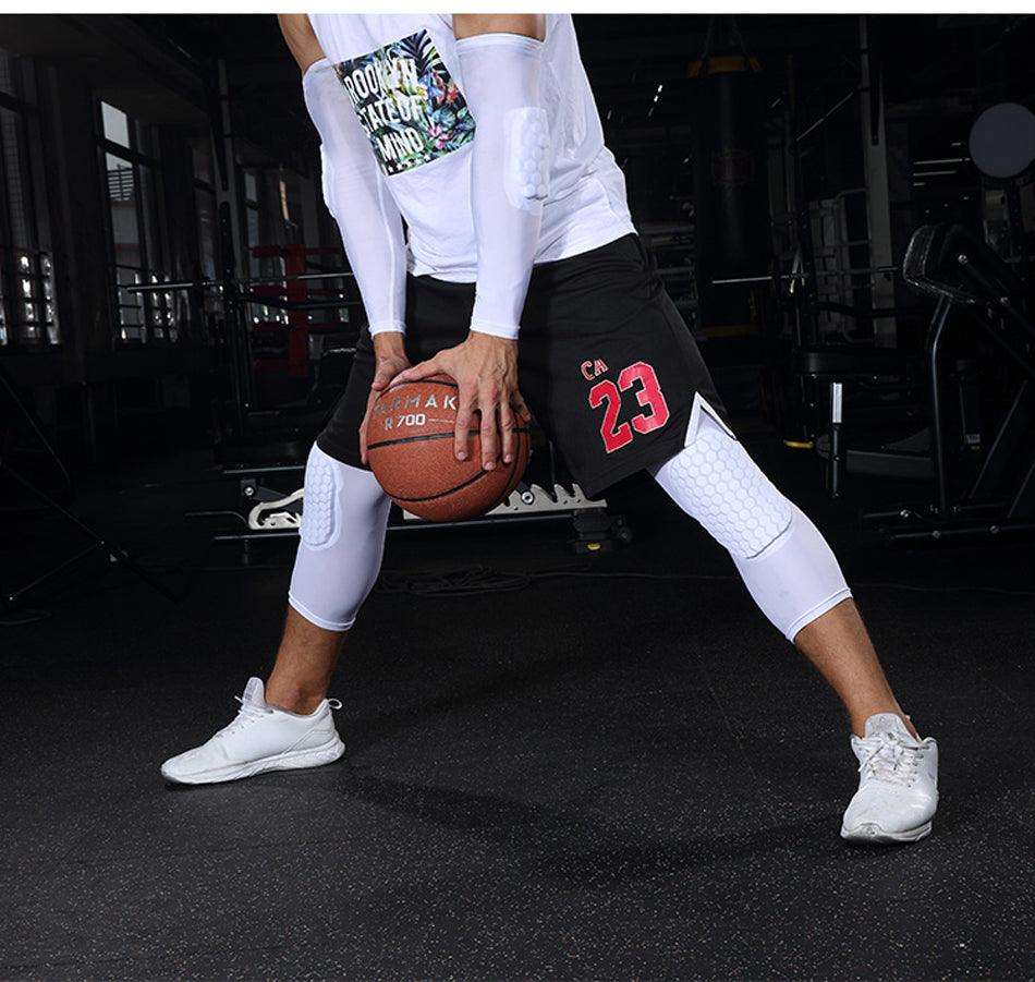 Black basketball knee pads by The Clothing Company Sydney with honeycomb foam for support, compression, and protection during sports.