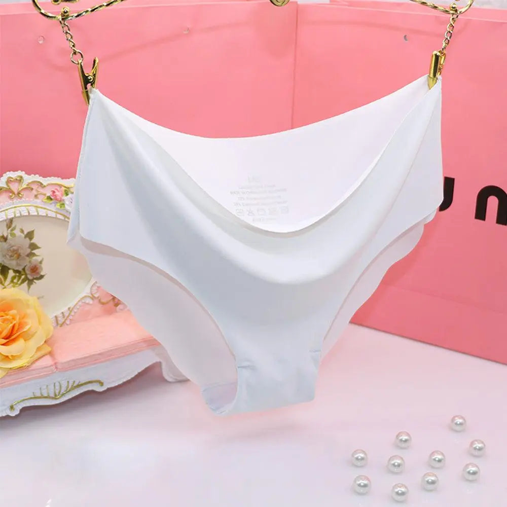 Women's seamless briefs by The Clothing Company Sydney, ultra-thin, soft, with ruffles and traceless trimming for a smooth fit.