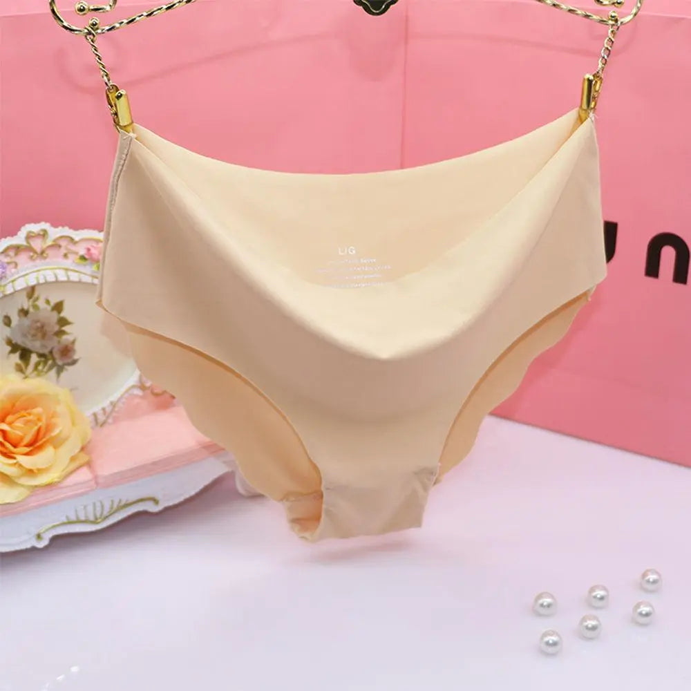 Seamless women's underwear by The Clothing Company Sydney with ultra-thin, traceless design and soft ruffle trimming.