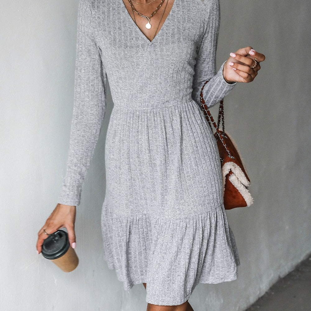 Grey ribbed A-line mini dress with V-neck and long sleeves, perfect for spring and autumn parties, by The Clothing Company Sydney