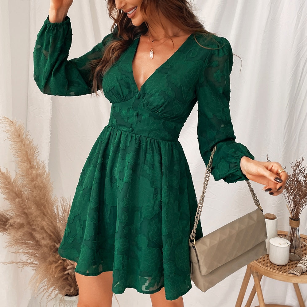 Green plunge A-line mini dress with long sleeves, perfect for spring and autumn parties, by The Clothing Company Sydney.