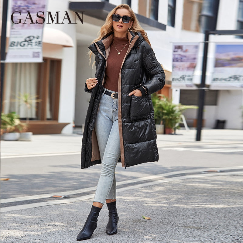 Women's down jacket by The Clothing Company Sydney featuring a long slim design, hood, stand collar, zipper, and large pockets.