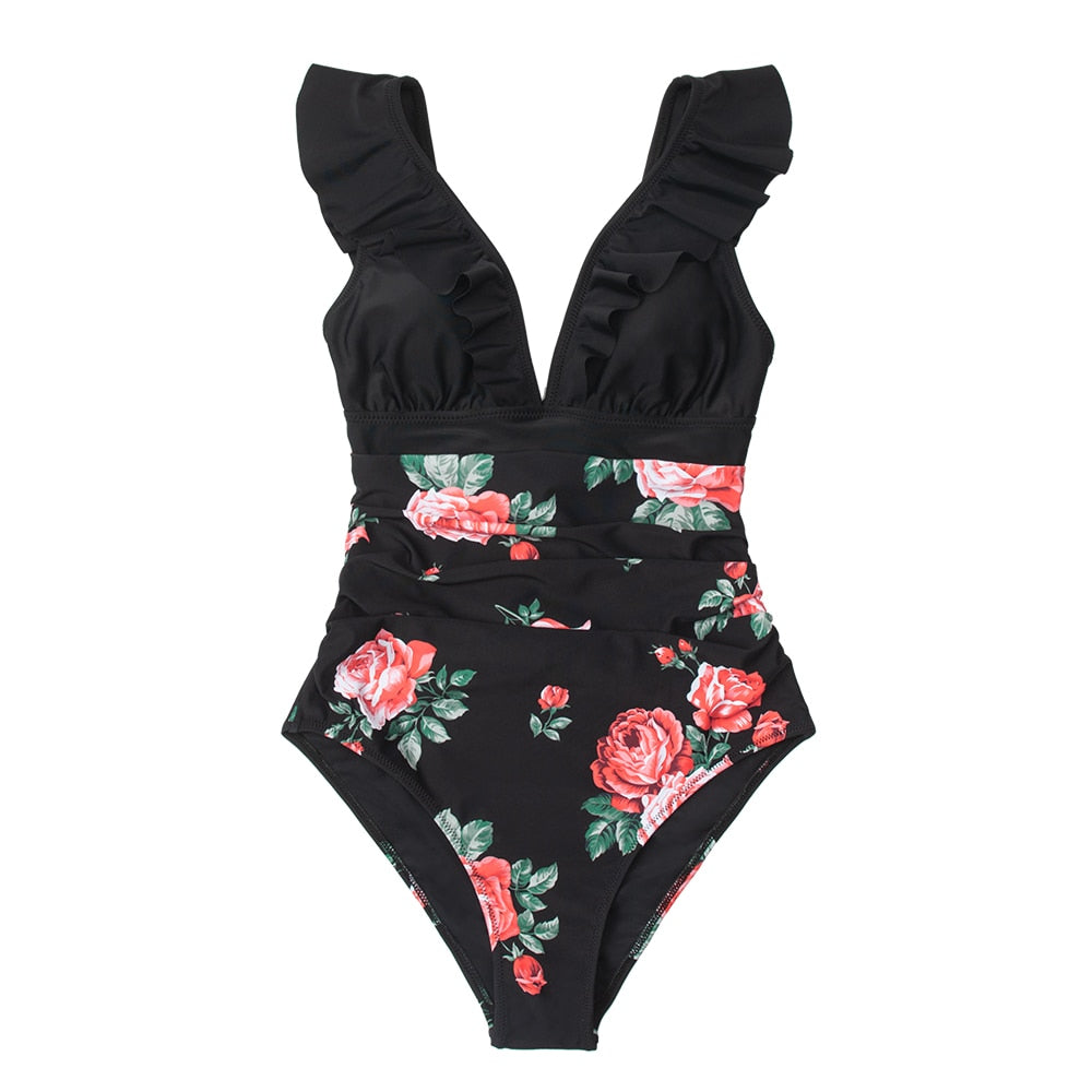 Black ruffled one-piece swimsuit with lace-up detail, from The Clothing Company Sydney, featuring stylish beachwear and bathing suit design.