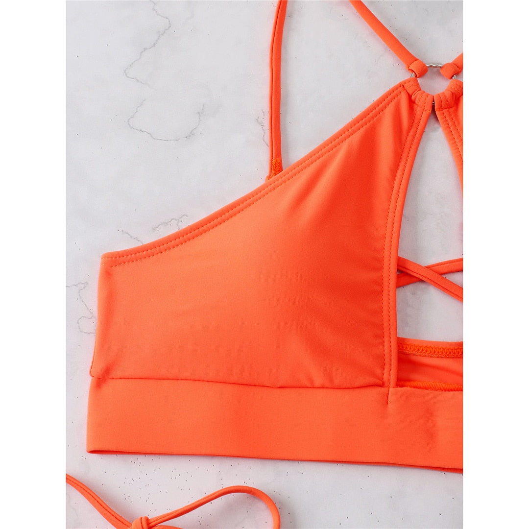 The Clothing Company Sydney cut out halter bikini swimsuit featuring padded cups, strappy design, and two-piece bathing suit style.