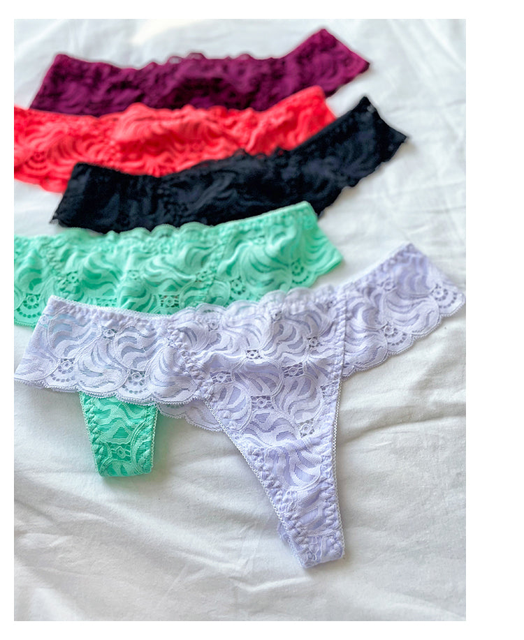 Lace low-waist briefs by The Clothing Company Sydney featuring breathable embroidery, transparent fabric, and G-string style lingerie.