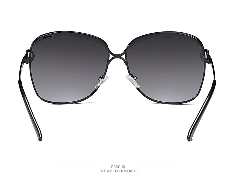 Polarized ladies sunglasses with gradient round lenses and square frame, luxury eyewear from The Clothing Company Sydney.