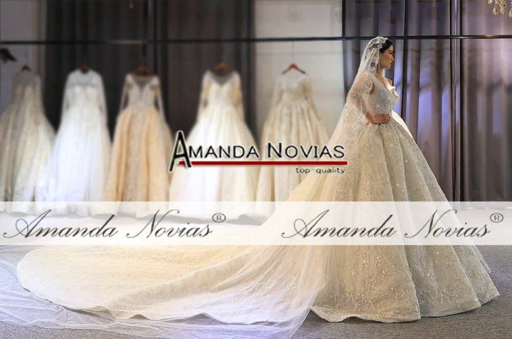 Luxurious wedding dress with heavy beading and intricate detailing, designed by The Clothing Company Sydney for bridal elegance.