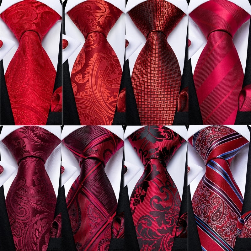 Red designer men's tie set featuring solid, striped, and paisley patterns with matching hanky and cufflinks, from The Clothing Company Sydney.