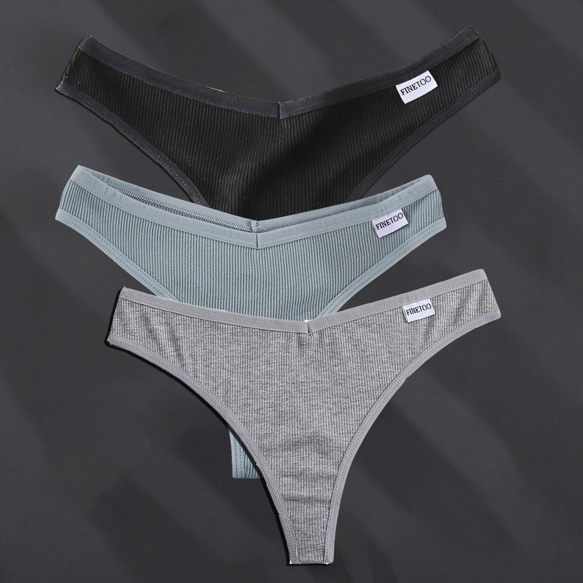 Three solid color cotton G-string panties from The Clothing Company Sydney, lightweight thong underwear for women.