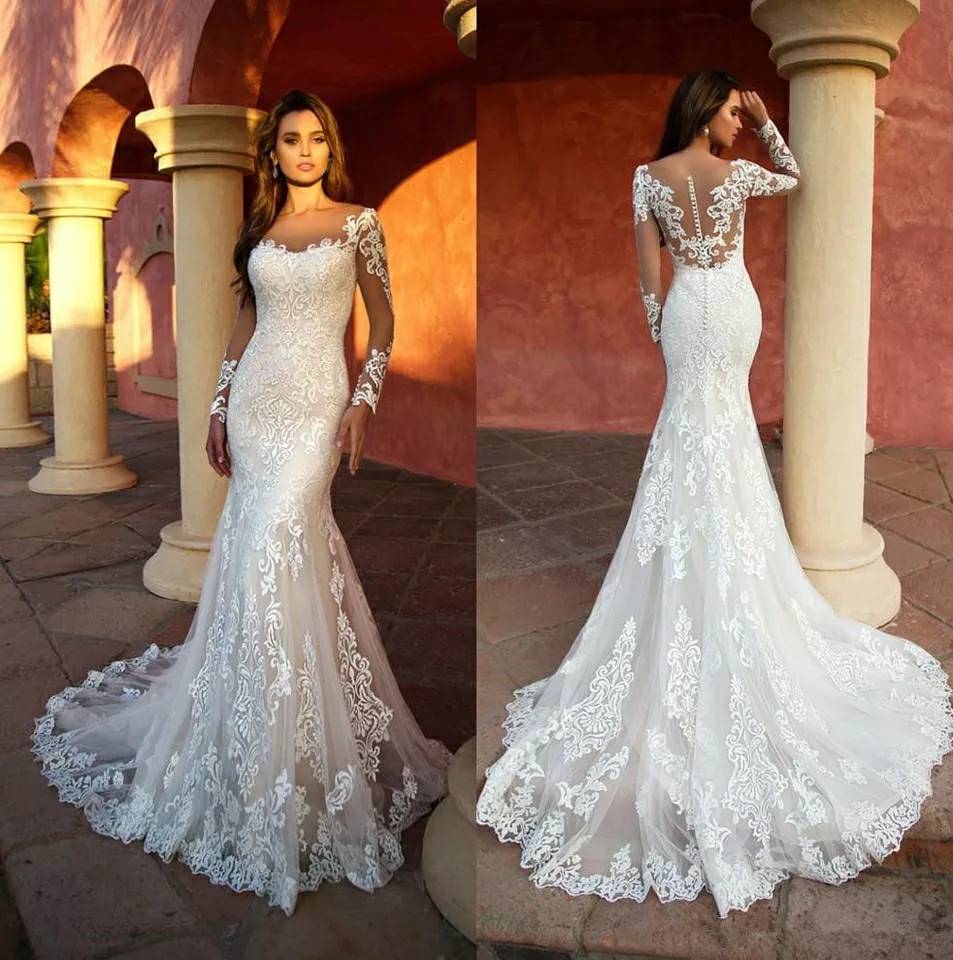Custom lace mermaid wedding dress with long sleeves, vintage white bridal gown featuring intricate lace details and a fitted silhouette.