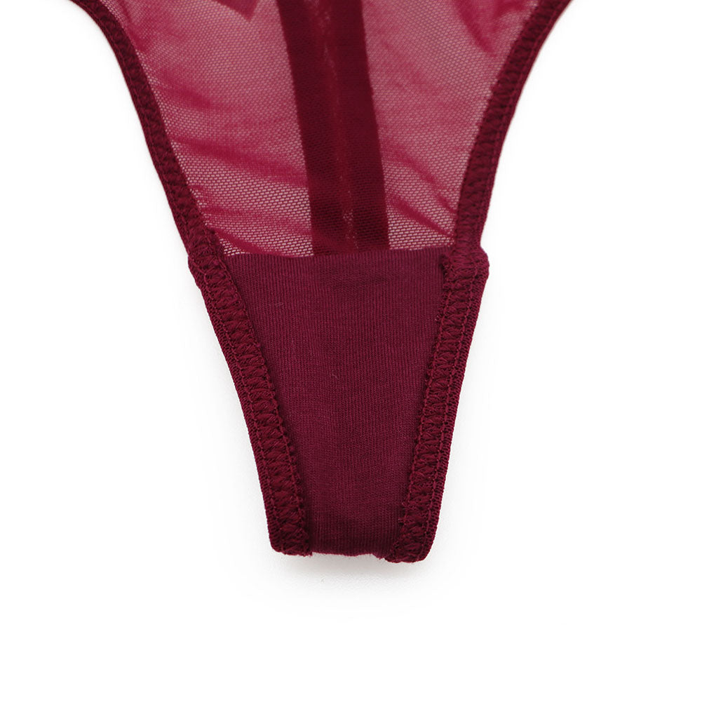 Ultra-thin transparent yarn lingerie set by The Clothing Company Sydney featuring bras, garters, thongs, and stockings.