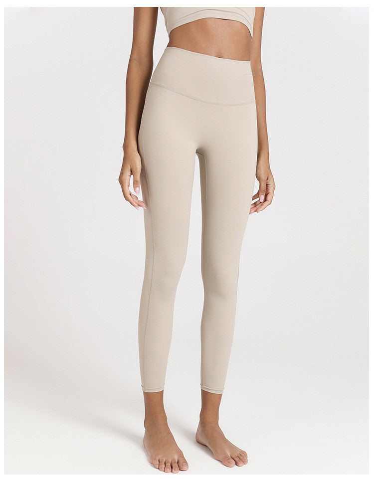 High waist women's yoga leggings with hidden big pocket, elastic soft fabric, quick-dry, ideal for Pilates and fitness activities.