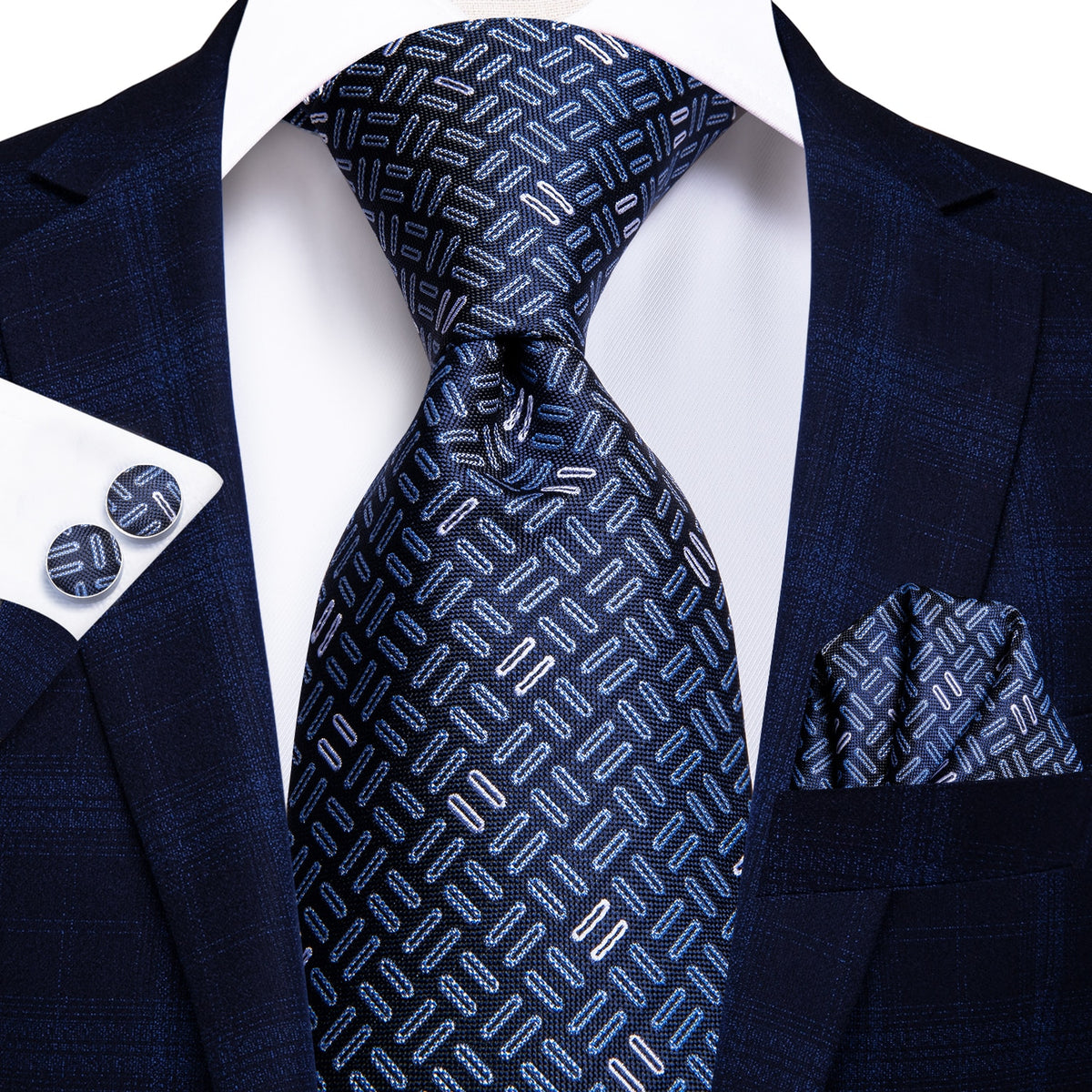 Three luxury silk men's accessories including paisley tie, pocket square, and cufflinks, ideal for formal and wedding attire.
