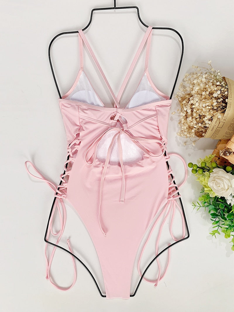 Backless bandage one-piece swimsuit by The Clothing Company Sydney featuring cut-out design and bodycon fit, ideal for beachwear.