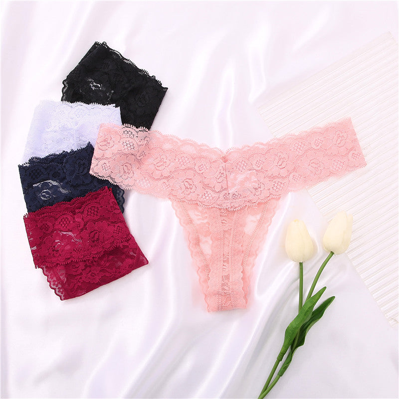 Pair of floral lace G-string thong panties from The Clothing Company Sydney, featuring transparent lingerie briefs.