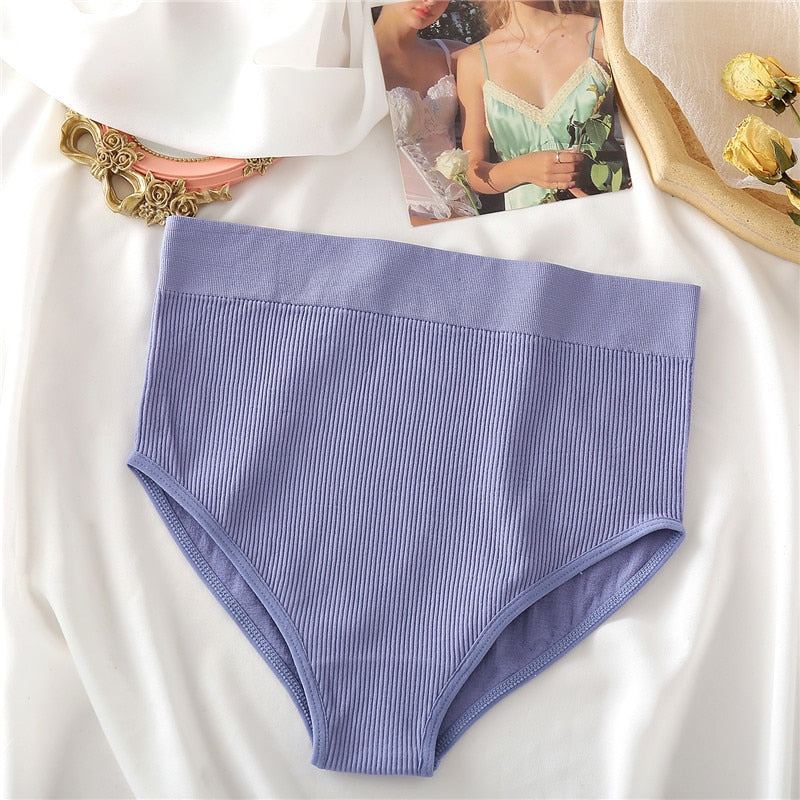 Two seamless women thong panties by The Clothing Company Sydney, made of comfortable cotton blend, featuring bikini G-string style lingerie.