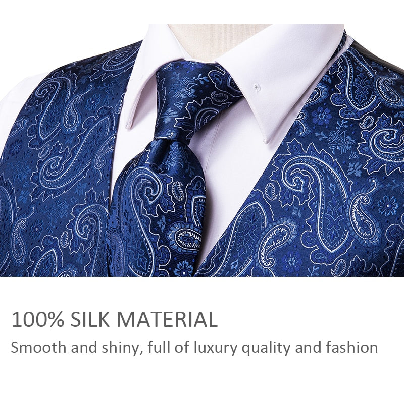 Men's luxury silk vest and tie set with paisley, floral, and plaid patterns in blue, gold, red, and silver for wedding attire.