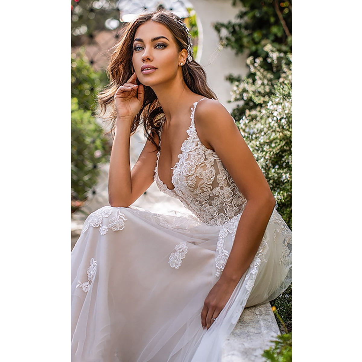 Long boho A-line backless wedding dress with 3D floral details, spaghetti straps, floor-length gown, perfect for brides.