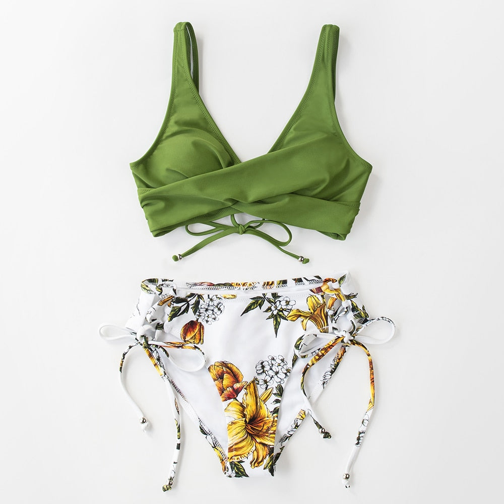 Mid-waist bikini swimsuit by The Clothing Company Sydney featuring lace-up detail and two-piece beach bathing suit design.
