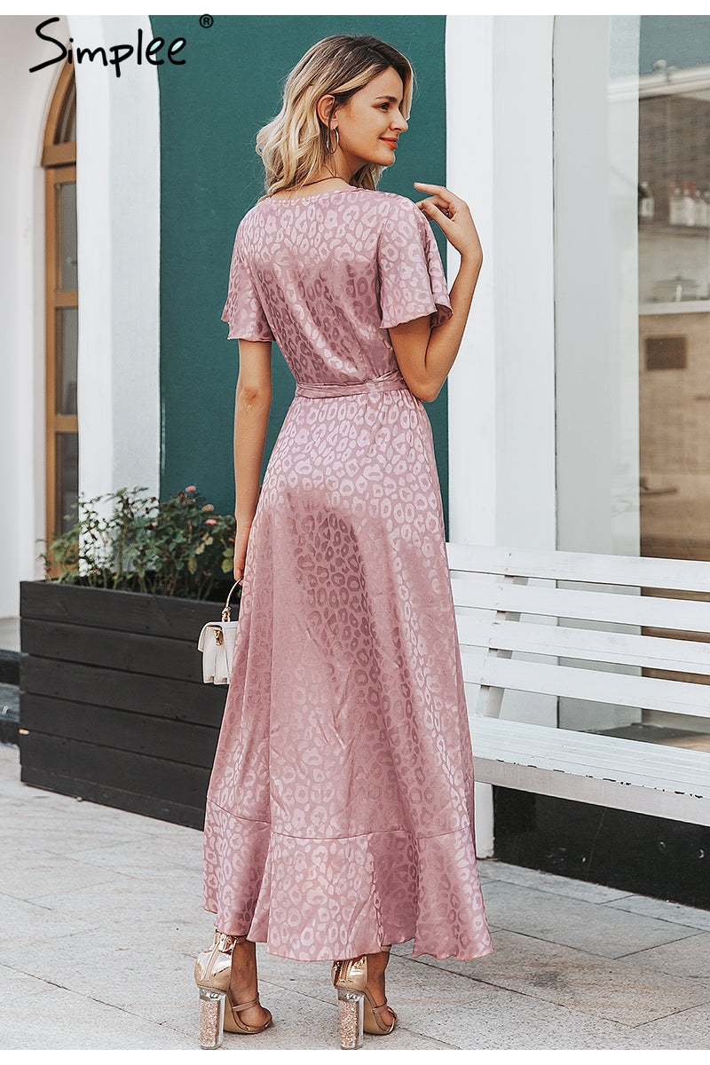 Leopard print party dress by The Clothing Company Sydney with V-neck, short sleeves, wrap design, ruffles, and split lace detail.