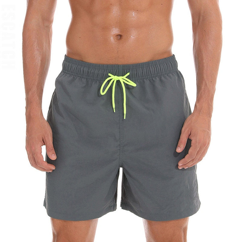 Men's swim shorts by The Clothing Company Sydney, featuring lightweight beach board shorts with quick-drying fabric and sporty design.