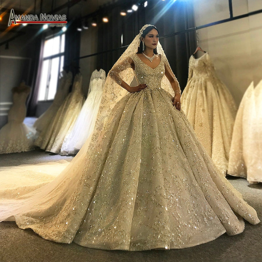 Luxury wedding gown with heavy beading and intricate details, bridal dress by The Clothing Company Sydney.