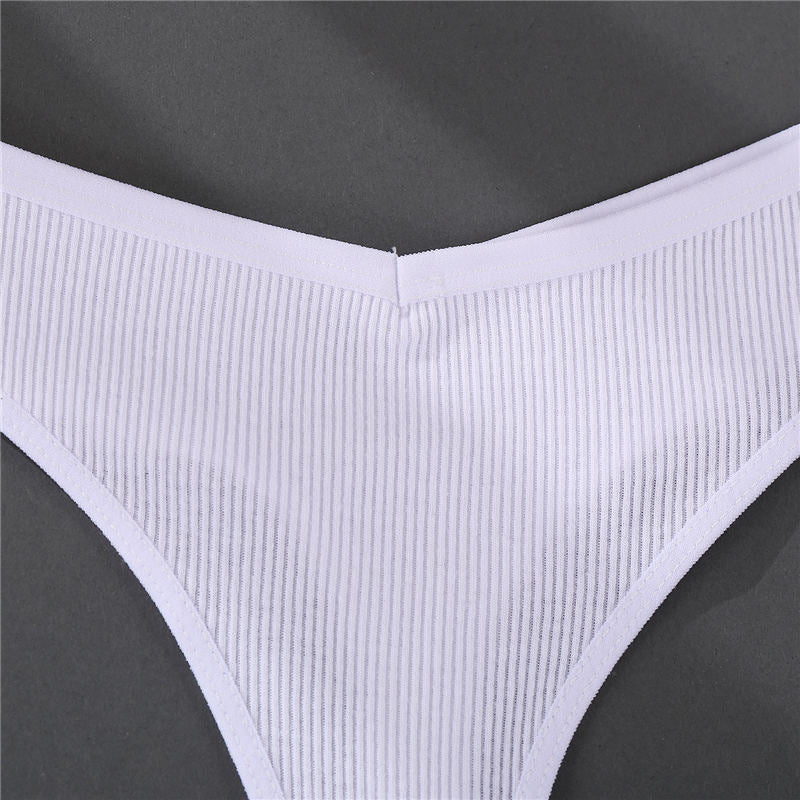 Three cotton G-string panties from The Clothing Company Sydney in solid colors, featuring comfortable thong underwear design.