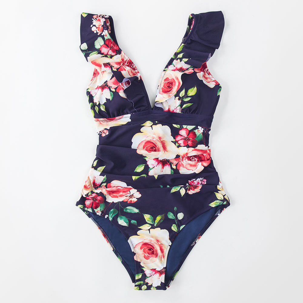 Solid black ruffled one-piece swimsuit with lace-up front by The Clothing Company Sydney, perfect for beach and poolside.