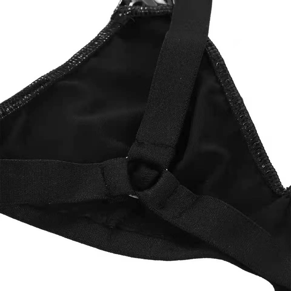 Two-piece wetlook leather bra and briefs set with glossy latex finish and adjustable belt from The Clothing Company Sydney.