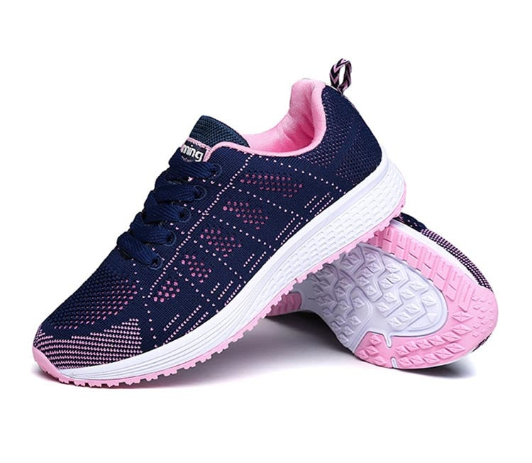 Women's lace-up sneakers by The Clothing Company Sydney featuring breathable fabric, platform sole, and vulcanized fashion shoe design.