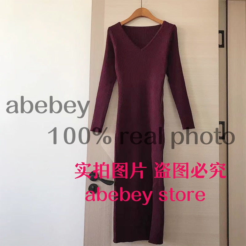 Slim fitting long sleeve slit sweater dress by The Clothing Company Sydney featuring a knit design, over-the-knee length, and stylish silhouette.