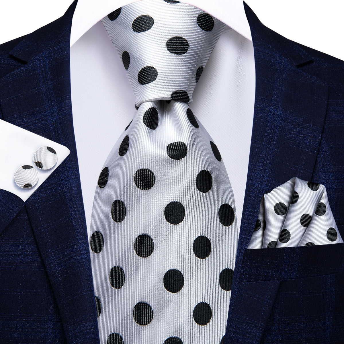 Three luxury men's accessories including a 100% silk paisley tie, cufflinks, and pocket square for formal and wedding attire.