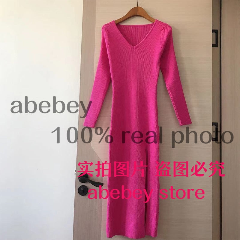 Slim fit long sleeve slit sweater dress by The Clothing Company Sydney, over-the-knee knit dress with a stylish slit detail.