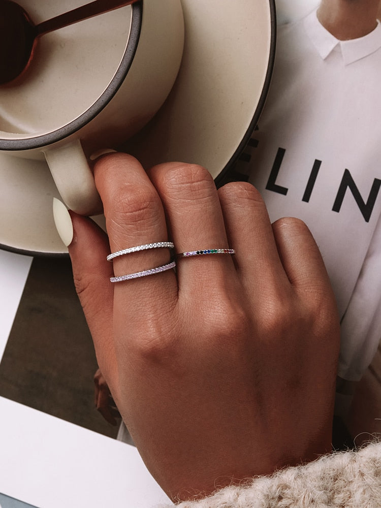 Sterling silver stackable eternity ring with CZ simulated diamonds, platinum plated, designed for women.