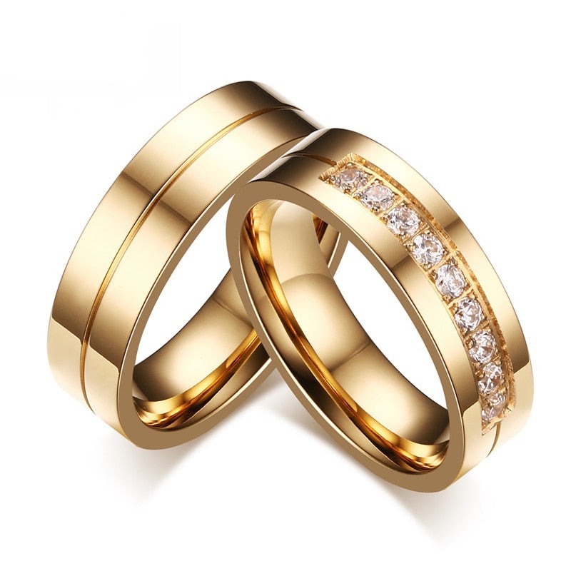 Gold-tone stainless steel wedding band bracelet with cubic zirconia for men and women, symbolizing love and commitment.