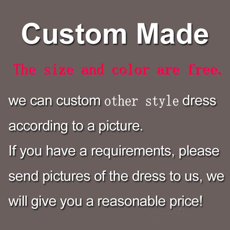 Long boho A-line backless wedding dress with 3D floral details, spaghetti straps, and floor-length design by The Clothing Company Sydney.