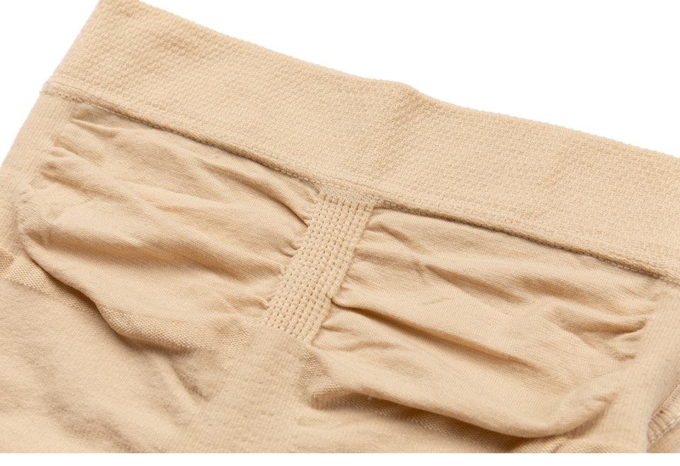 Women’s strapless shapewear slip from The Clothing Company Sydney, seamless full-body shaper for tummy control under dresses and skirts.