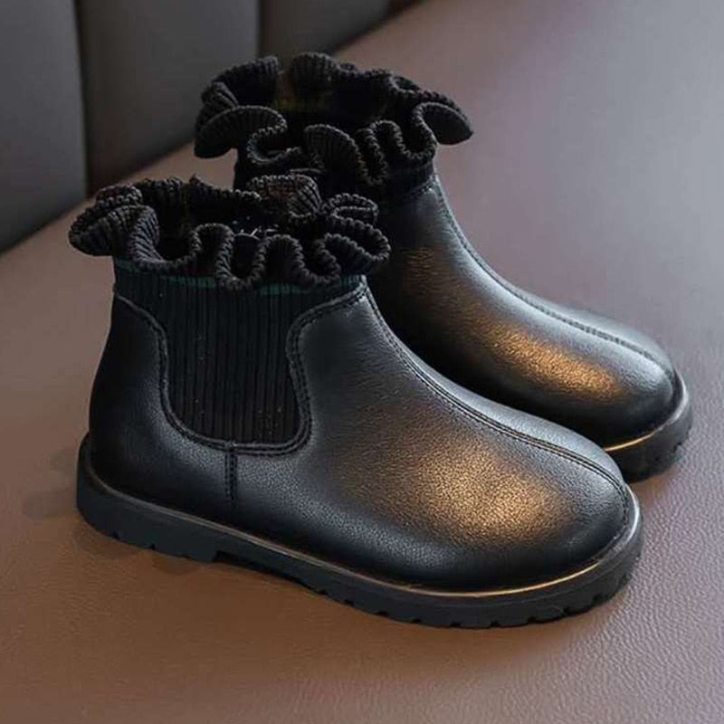 Kids flower girl boots by The Clothing Company Sydney, plush warm leather winter shoes for children, soft and stylish for autumn and winter.