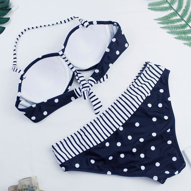 Black polka dot bikini from The Clothing Company Sydney featuring padded push-up swimsuit top and matching swimwear bottom.
