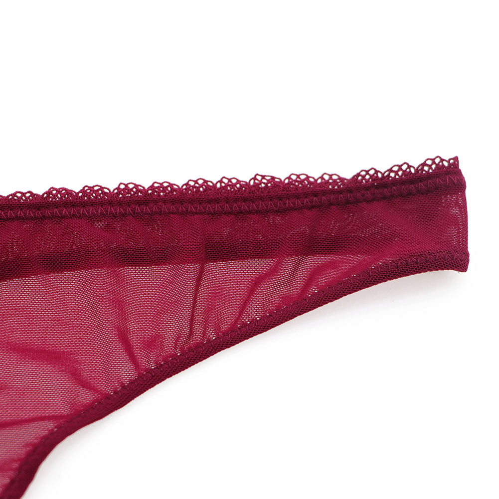 Ultra-thin transparent yarn lingerie set by The Clothing Company Sydney, featuring bras, garters, thongs, and stockings.