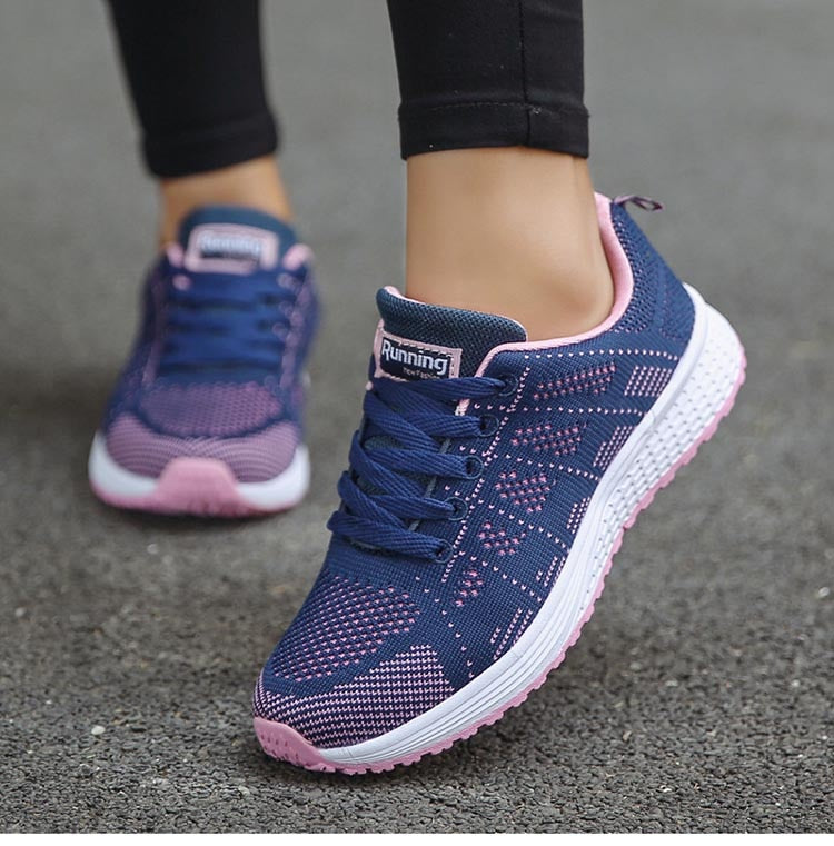 Women's lace-up sneakers by The Clothing Company Sydney featuring platform style, breathable fabric, and vulcanized sole.