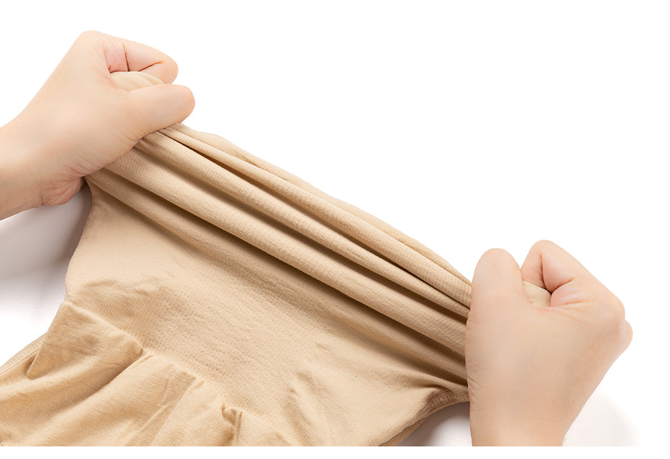 Women’s strapless shapewear slip from The Clothing Company Sydney, seamless full-body shaper with tummy control under dress.