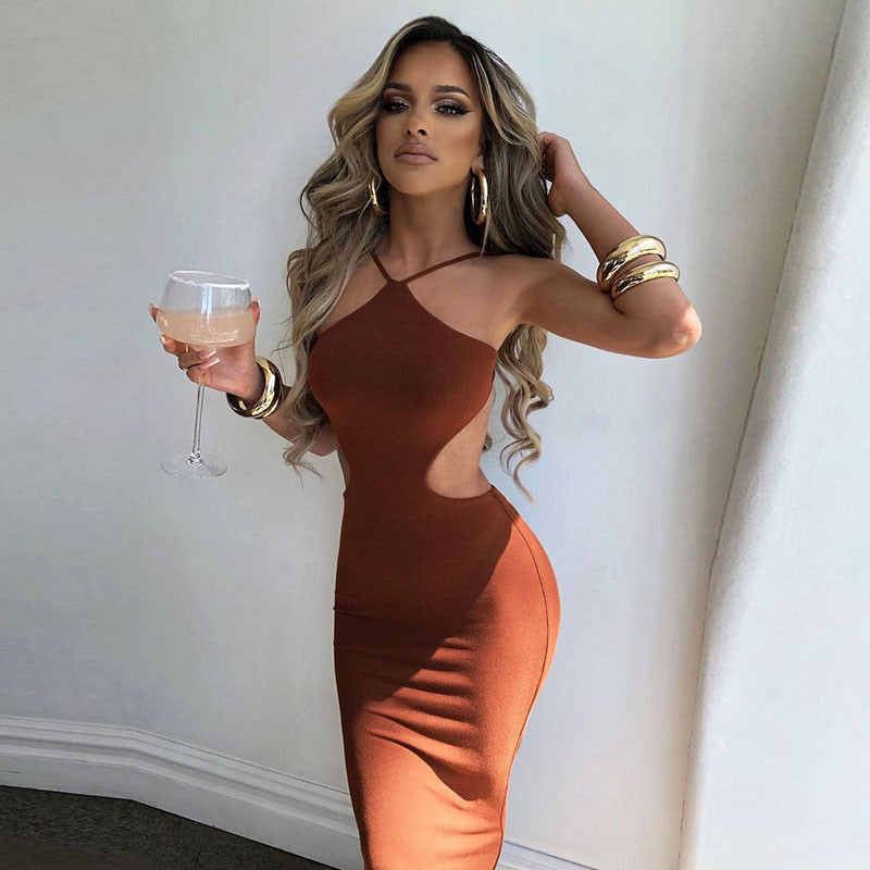 Elegant sleeveless summer halter maxi dress by The Clothing Company Sydney featuring a backless design and stylish cutout details.