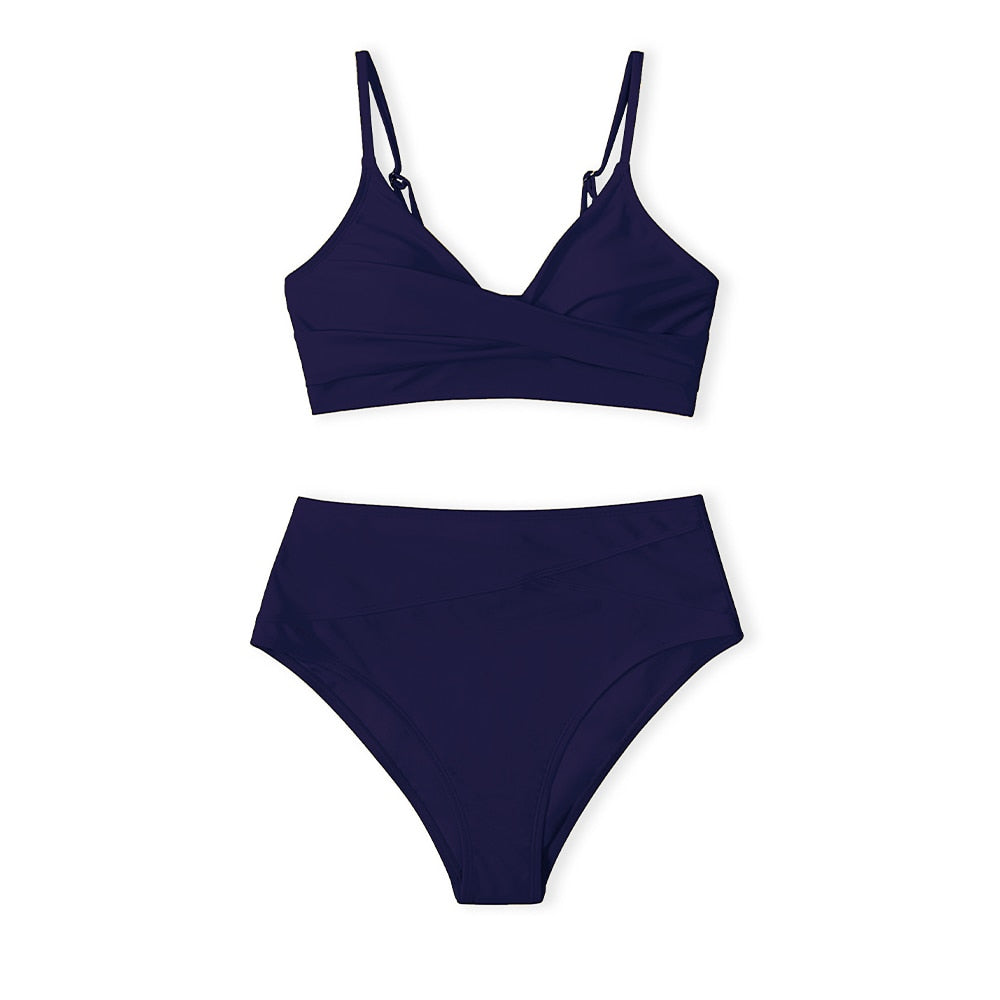 Red high-waist bikini swimsuit with V-neck from The Clothing Company Sydney, featuring a twist tank design and solid color for beachwear.
