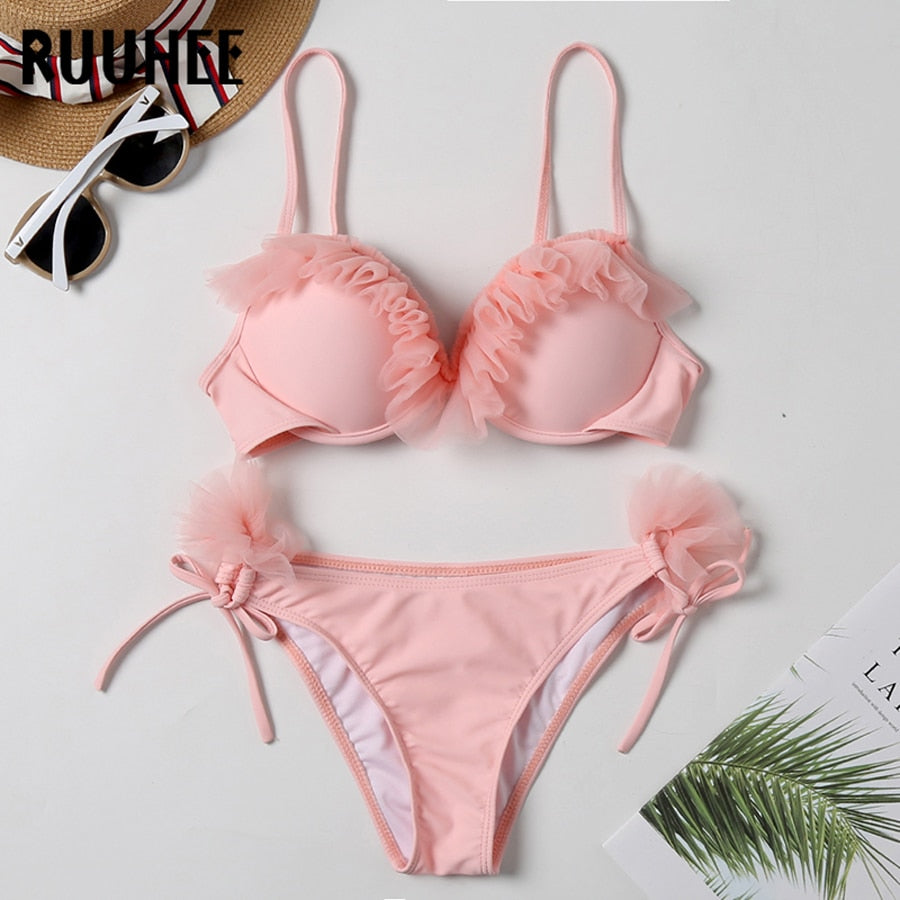 Two-piece leopard print bandeau bikini set with ruffles and push-up design, stylish swimwear for women by The Clothing Company Sydney.