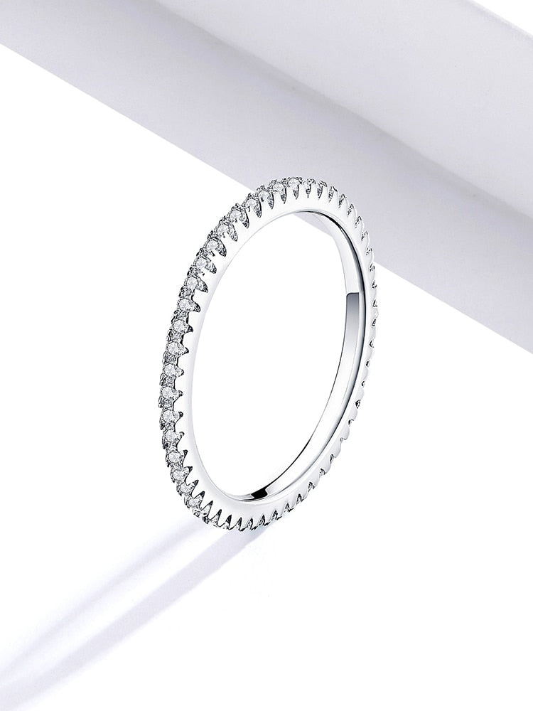 Sterling silver CZ simulated diamond stackable eternity ring with platinum plating, designed for women, shown in a close-up image